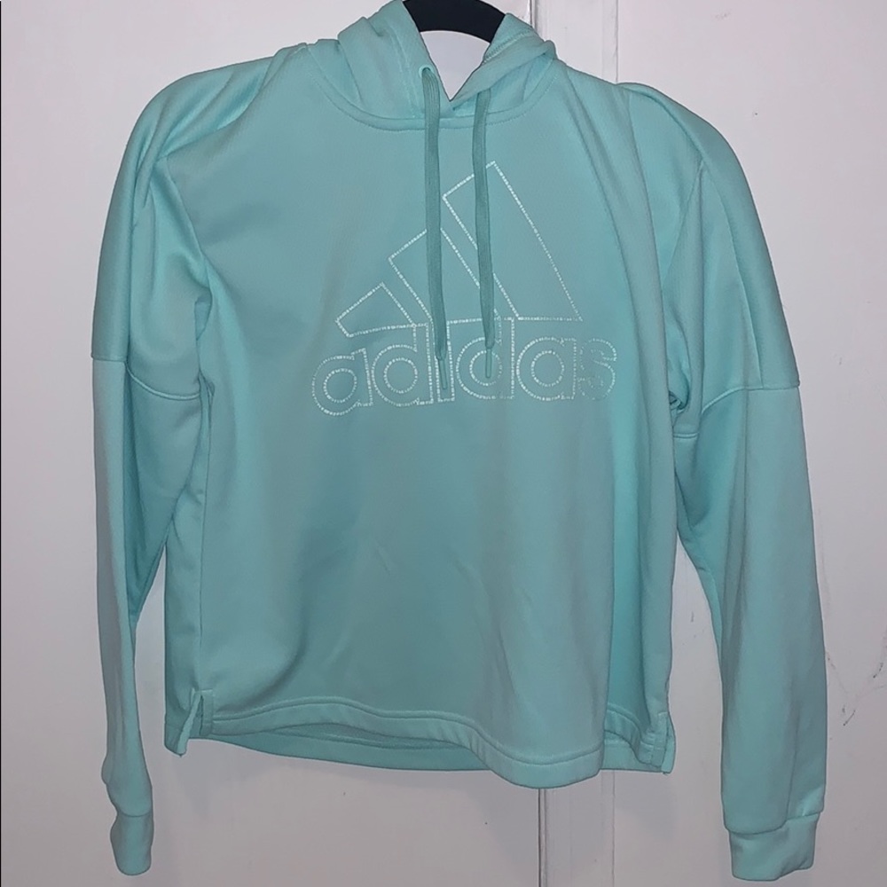 Teal adidas sweatshirt. Only worn once or twice.